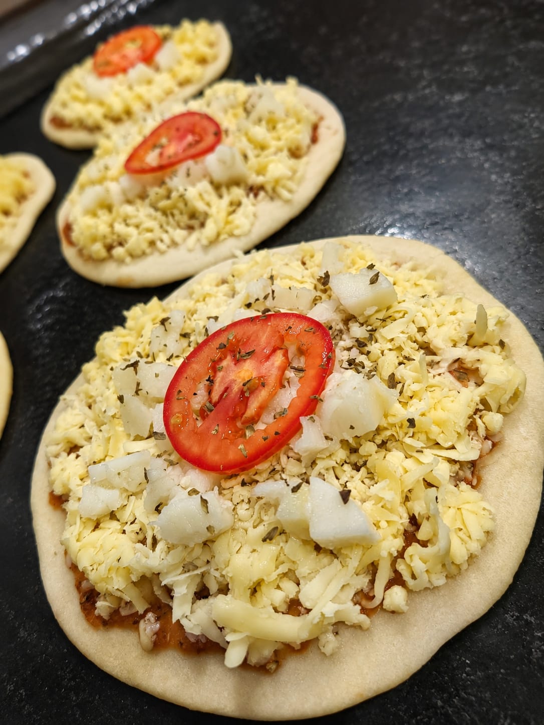 Produção real de mini pizzas